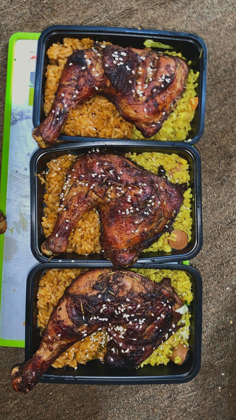 Jollof rice, fried rice and chicken 
